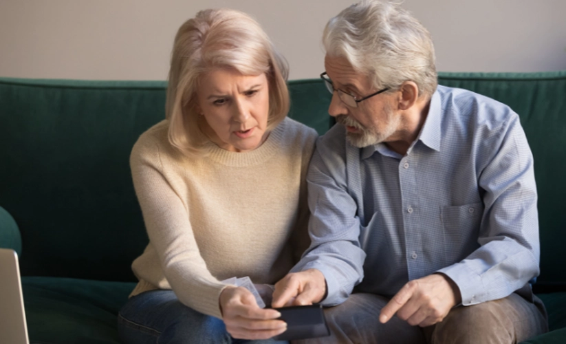 an old couple calculates taxes