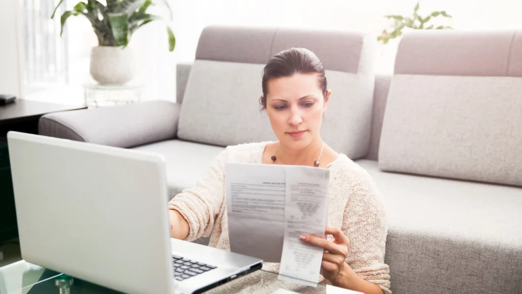 woman-reviewing-taxes-1024×577 (1)